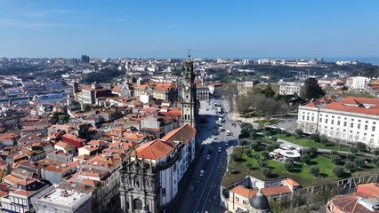 Fototapeta premium Clerigos Tower In Porto Portugal. Medieval Building In A Bustling City Viewed From Above. Metropolitan Skyline Panoramic City View Stunning. Metropolitan Architecture Business. Porto Portugal.