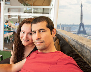 Happy couple, selfie and love in coffee shop on vacation and post on social media.Couple and bonding in restaurant on profile picture and romantic memory on smartphone gallery at Paris,France