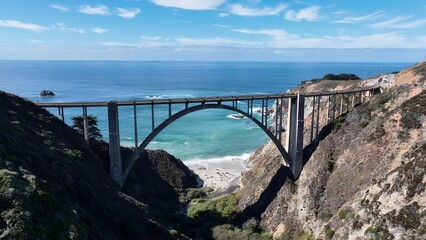 Bixby Creek Bridge In Highway 1 California United States. Aerial View Of Landmark Bridge Showcasing...