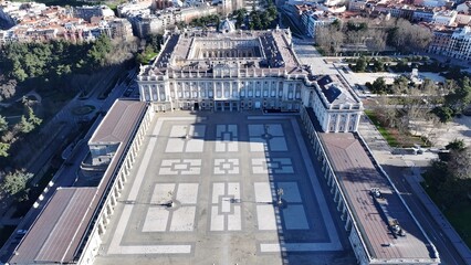 Fototapeta premium Royal Palace Of Madrid In Madrid Spain. Aerial View Of A Bustling Downtown Cityscape With Modern Buildings. Town Sky Backgrounds Urban. Outside Backgrounds Up Above. Madrid Spain.