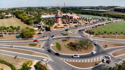 Famous Mill In Holambra Sao Paulo Brazil. Traditional Orange Windmill Celebrating The Spring Start. Countryside Sky Clouds Rural Field. Countryside Rural Panning Wide. Holambra Sao Paulo.