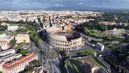 Rome Coliseum In Rome Lazio Italy. City Skyline Showing Modern And Traditional Architecture. Business Sky Clouds Downtown Cityscape. Outdoor Downtown Panning Wide. Rome Lazio.
