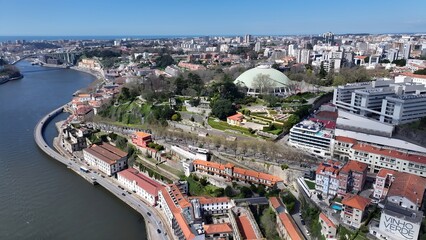 Obraz premium Super Bock Arena In Porto Portugal. Modern Football Stadium Overlooking A Dense Downtown City. Business Clouds Sky Downtown Cityscape. Backgrounds Panoramic. Porto Portugal.