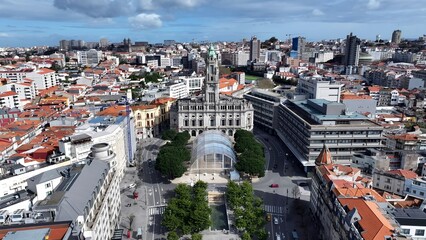 Fototapeta premium City Hall In Porto Portugal. Aerial View Of A Bustling City With High-Rise Buildings And Traffic. Business Sky Clouds Downtown Cityscape. Outdoor Downtown Panning Wide. Porto Portugal.