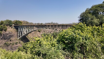 Bridge Border In Victoria Falls Northern Rhodesia Zambia. Elevated Road Bridge Symbol Of The City...