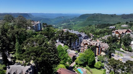 Obraz premium Gramado Skyline In Gramado Rio Grande Do Sul Brazil. Capturing A Suburban Residential Neighborhood From Above. Business Sky Background Downtown Cityscape. Backgrounds Panorama.