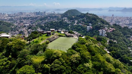 Obraz premium Favela Tour In Rio De Janeiro Brazil. Stunning Favela Landscape In A Mountain In A Famous City. Business Clouds Sky Downtown Cityscape. Backgrounds Panoramic. Rio de Janeiro Brazil.