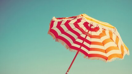 Colorful beach umbrella clear blue sky