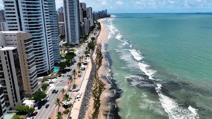 Boa Viagem Beach In Recife Pernambuco Brazil. Turquoise Ocean Waves Gently Crashing On Tropical Beach. Business Sky Downtown Cityscape. Business Downtown Panorama. Recife Pernambuco. © bydronevideos