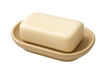 Single bar of soap resting on ceramic soap dish with transparent background
