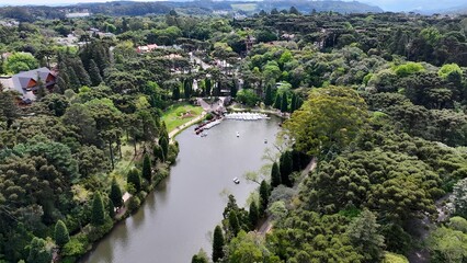 Lago Negro In Gramado Rio Grande Do Sul Brazil. Aerial View Of A River Surrounded By Lush Green Tropical Rainforest. Business Clouds Sky Downtown Cityscape. Backgrounds Panoramic.