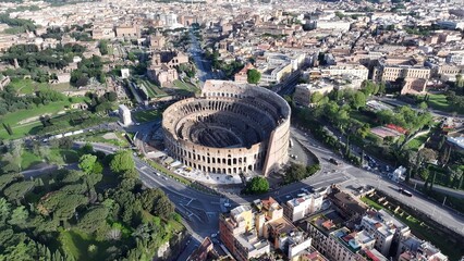 Obraz na płótnie Canvas Rome Coliseum In Rome Lazio Italy. Aerial View Of Landmark Medieval Building In Downtown Scene. Town Sky Clouds Backgrounds Urban. Town Outdoor Downtown Panning Wide. Rome Lazio.