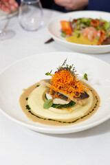 Chef's fish on a bed of puree