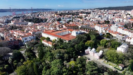 Fototapeta premium Botanical Garden In Lisbon Portugal. Bustling Downtown Cityscape With Modern Buildings. Business Sky Downtown Cityscape. Business Downtown Panorama. Lisbon Portugal.