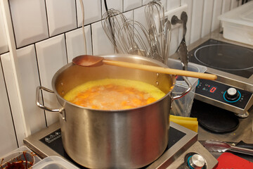 cooking soup in the kitchen