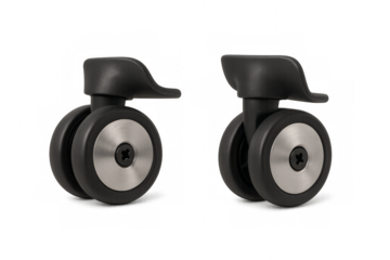 Two black rolling wheels with metal hubs on transparent background