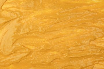 Yellow sauce splashes as a background.