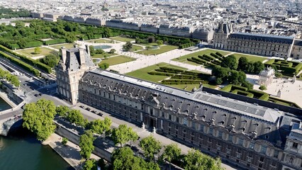 Louvre Museum In Paris Ile De France France. Modern Glass Skyscraper Soars Above A Bustling City....