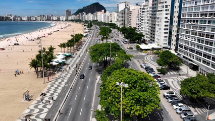 Shore Avenue In Copacabana Beach Rio De Janeiro Brazil. Bustling Downtown Cityscape With Modern...