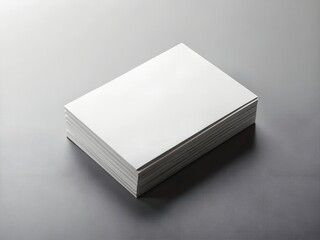 Fototapeta premium Stack of blank white business cards, minimalist studio background