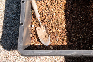 Soil and Gardening Trowel in Container