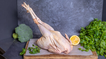 fresh chicken on the cutting plate