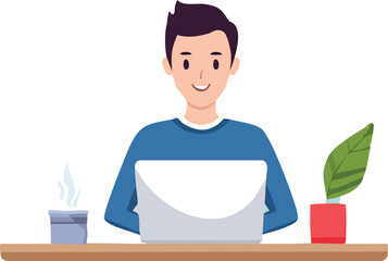 A young man smiles while working on a laptop at a desk with plants.