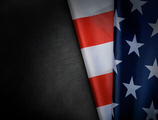 American flag with stars and stripes on a dark textured background