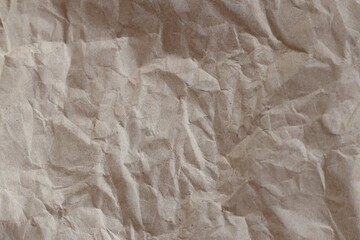 Brown crumpled recycled paper texture background. Kraft Paper