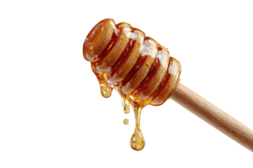 Honey dripping from a wooden dipper (2)