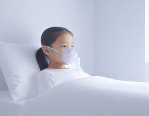 Child receiving oxygen treatment in a hospital bed