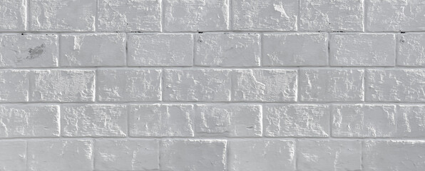 White painted brick wall texture forming a seamless background