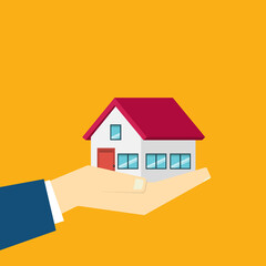 Hand holding house	