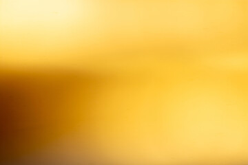 Luxury of light yellow and gold blurred gradient background has a little abstract light. sunlight...