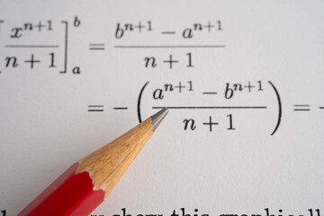 Pencil on mathematic formula exercise test paper in education school.