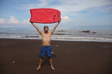 Young surfer embracing coastal lifestyle