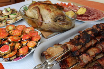 festive christmas dinner roast duck with apples and barbecue