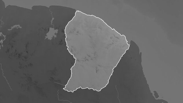 French Guiana on the map. Zoom and highlight of the area on a grayscale map.