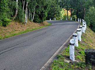 Stone pillars have served for ages as bollards on mountain roads in the Sudetenland. Honest work of...