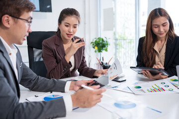 Asian business group meeting, document work, investment structure chart, work in the office	