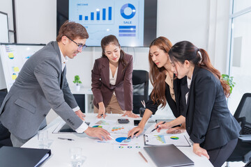 Group of Asian businesspeople are having a meeting.