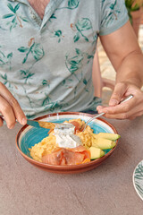 Deliciously Plated Breakfast with Creamy Avocado, Soft Scrambled Eggs, and Fresh Salmon for a Nutrient-Rich Start to Your Day