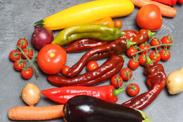Various fresh vegetables on a light background, top view, copy space. Healthy eating concept. 