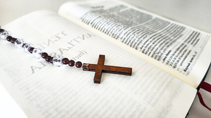 Wooden Rosary Cross on Turkish Written Christian Bible