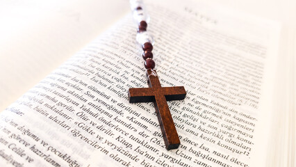 Wooden Rosary Cross on Turkish Written Christian Bible