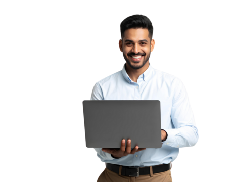 An attractive Indian man smiling and using a laptop on a white table, isolated on transparent background.