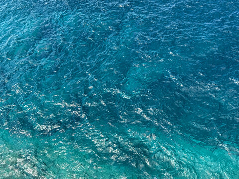 Sea blue azure water background aerial view.