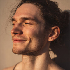 Obraz premium Front view portrait of a 25-year-old skinny Caucasian male model with messy hair and clear skin, under vibrant sunny daylight.