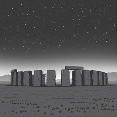 Stonehenge under a starry night in England on a foggy March morning