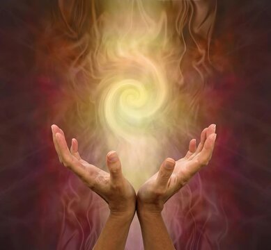Female healer working with double helix vortex of golden healing energy